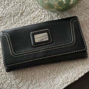 Michael Kors’s wallet, black leather
